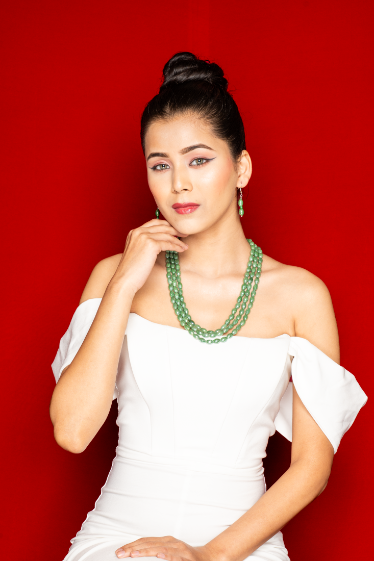 Multi-layered Green Beaded Necklace with matching drop Earrings.