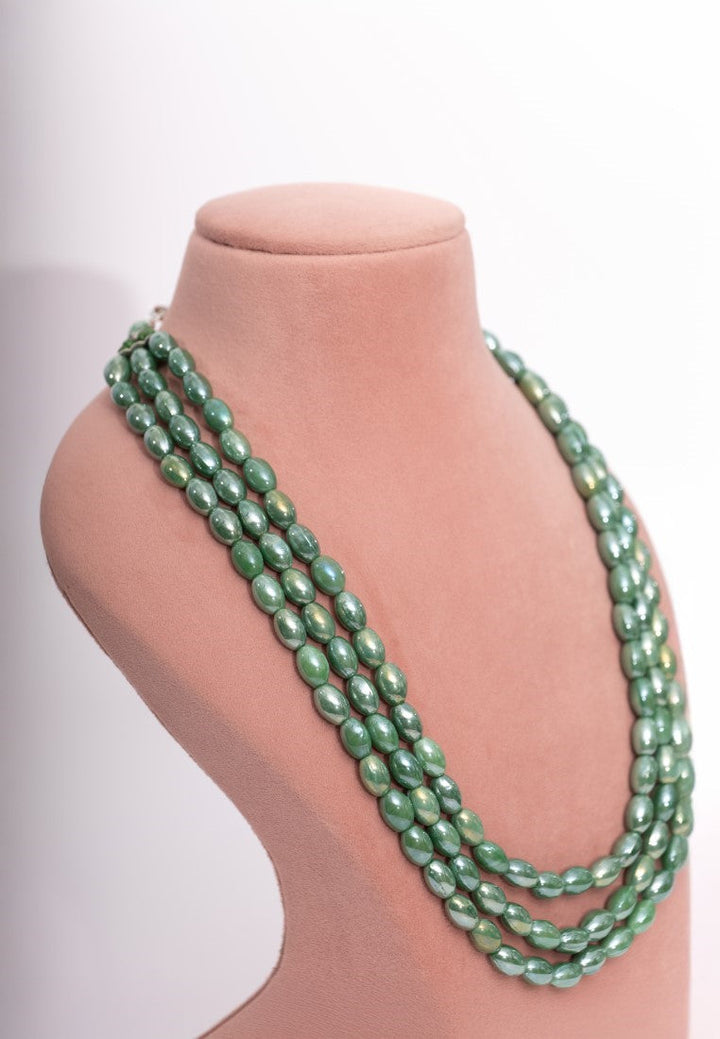 Multi-layered Green Beaded Necklace with matching drop Earrings.