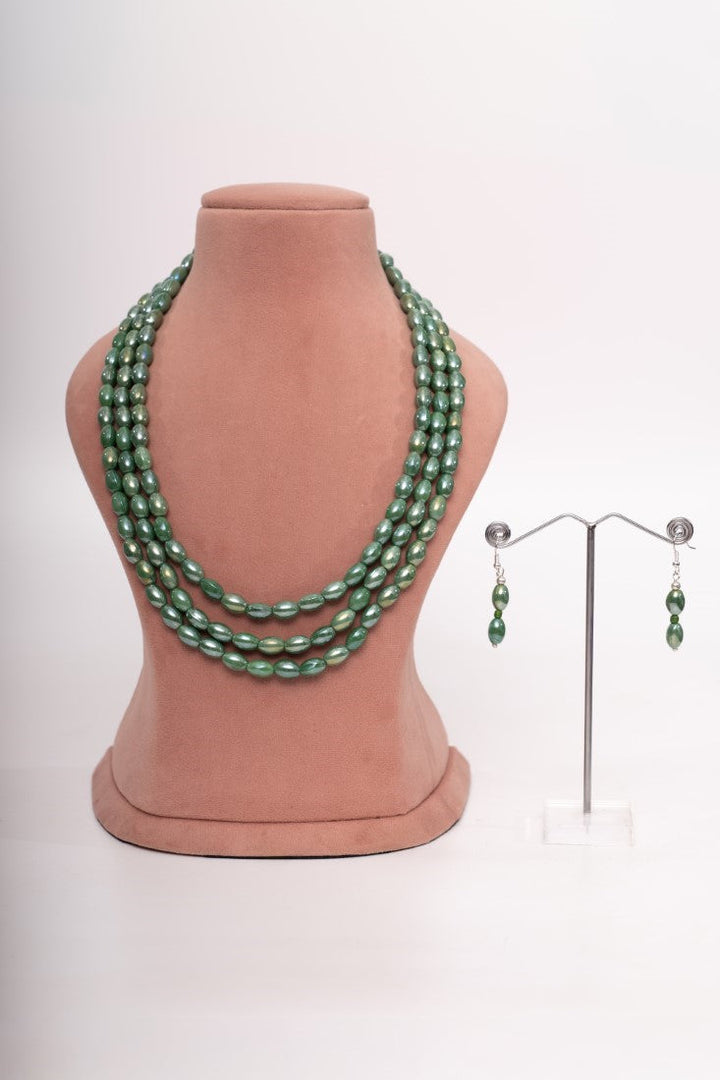 Multi-layered Green Beaded Necklace with matching drop Earrings.