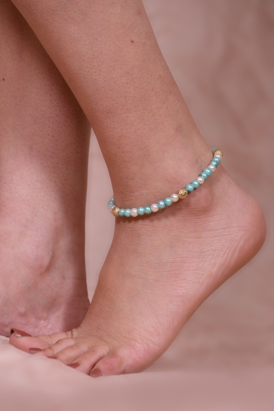 White & Sea Green Pearl Beads Anklet Styled With Metal Beads In It