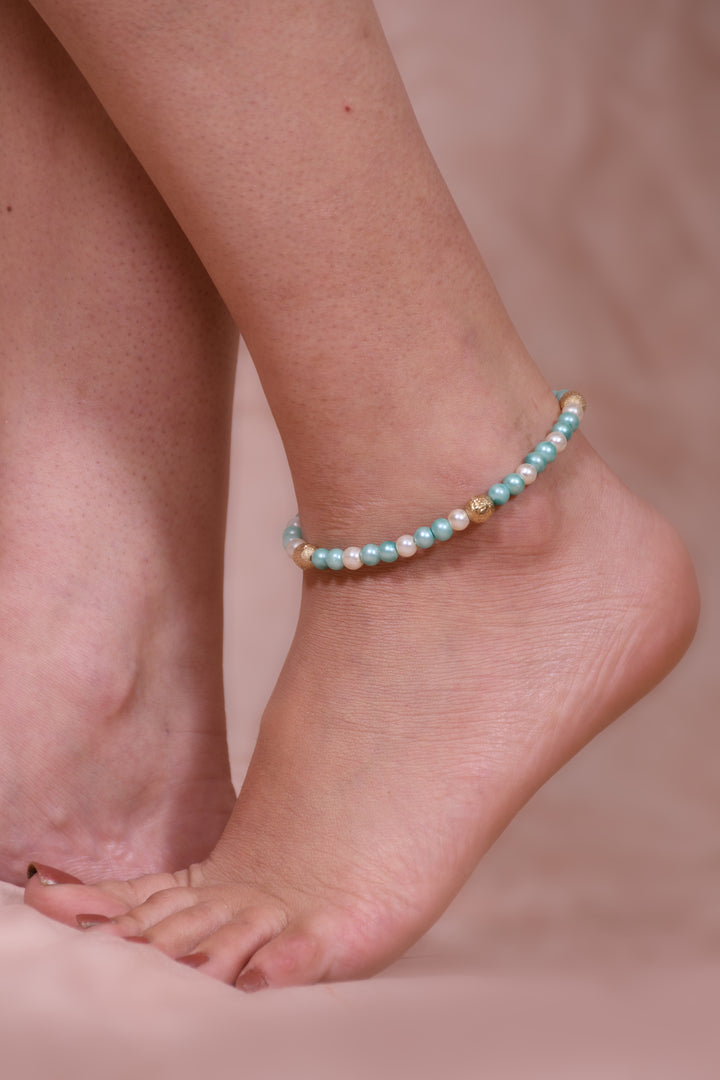 White & Sea Green Pearl Beads Anklet Styled With Metal Beads In It