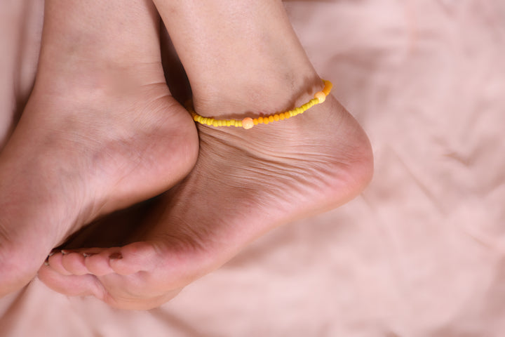 Two Toned Yellow Colored Beads Anklet Styled With Round Orange Glass Beads