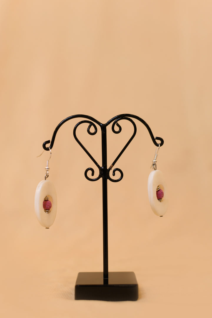 Scooped Shell Earing With Red Beads Strung Inside