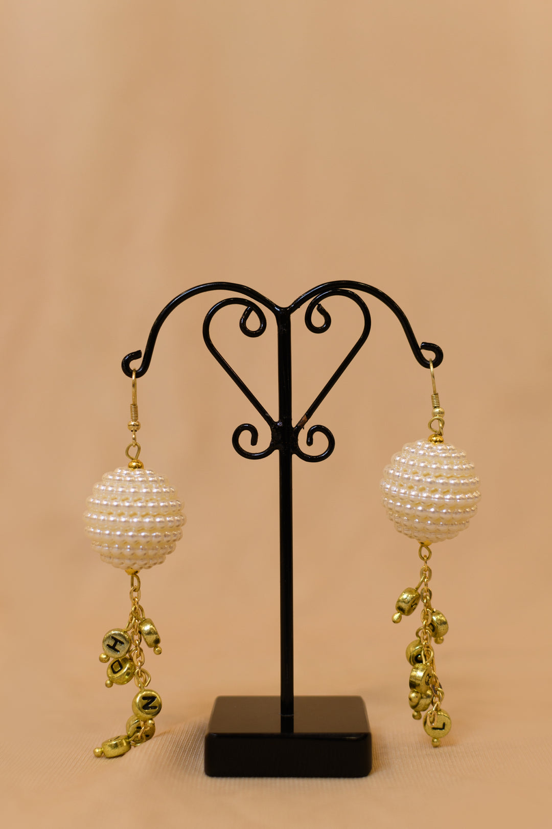 Beaded Pearl Ball Earings With Metal Beads Hanging At The Bottom