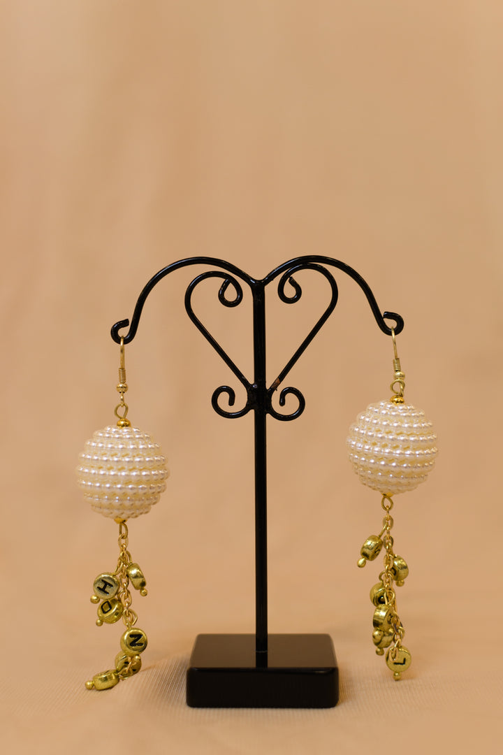 Beaded Pearl Ball Earings With Metal Beads Hanging At The Bottom