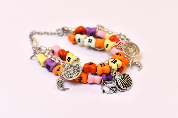 Multi Layer Plastic Bead Bracelet with Metal Charms