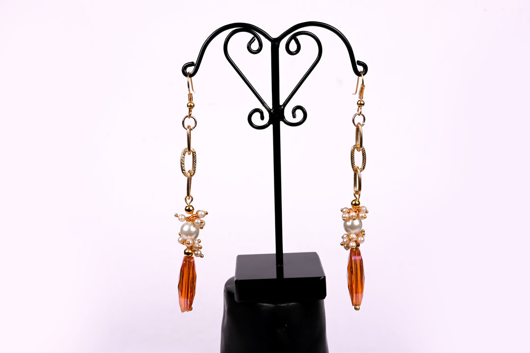 Gold Polished Metal Chain Earring Styled With Pearl Beads & Multi Faceted Leaf Shaped Glass Beads