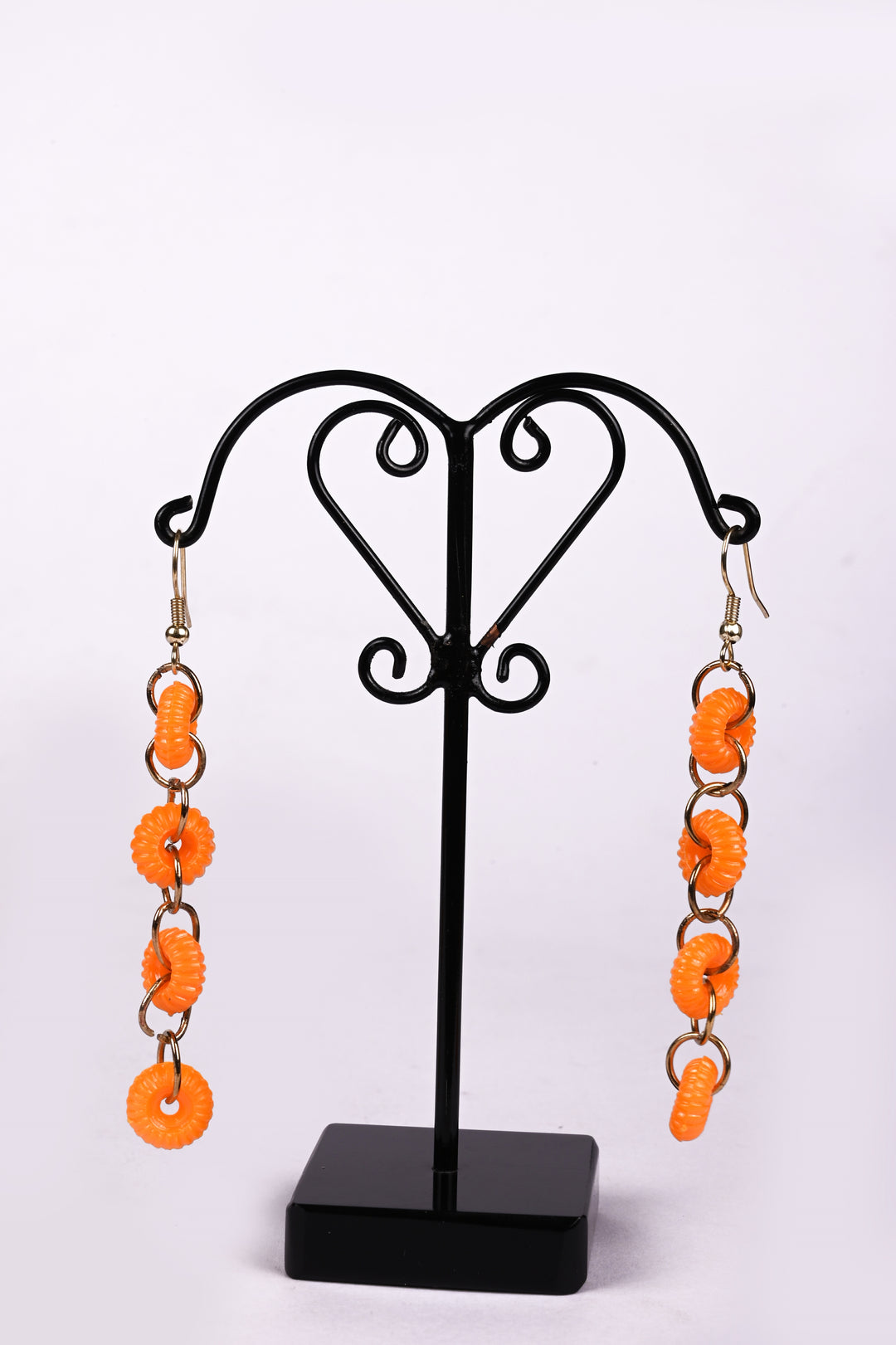 Metal Chain Earring Strung With Orange Colored Tyre Shaped Beads