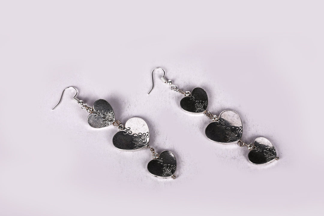 Metal Earring Made Of Heart Shaped Metal Beads