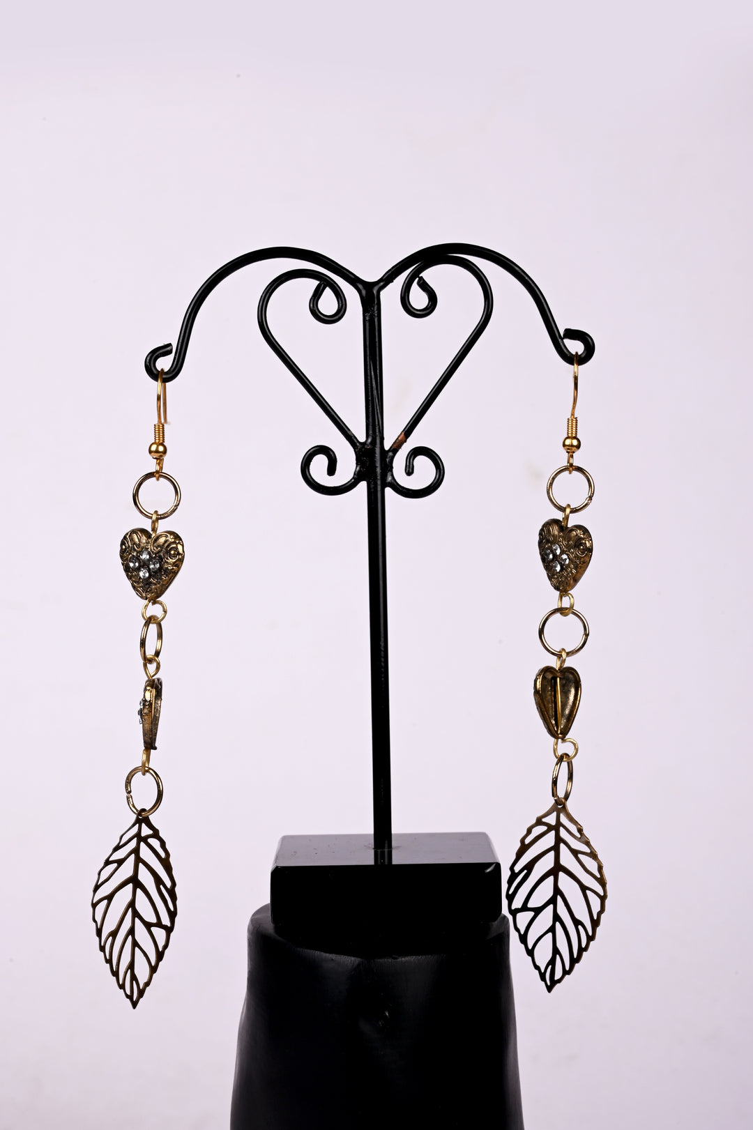 Heart Shaped Metal Charms Earring Styled With Metal Leaf Charms
