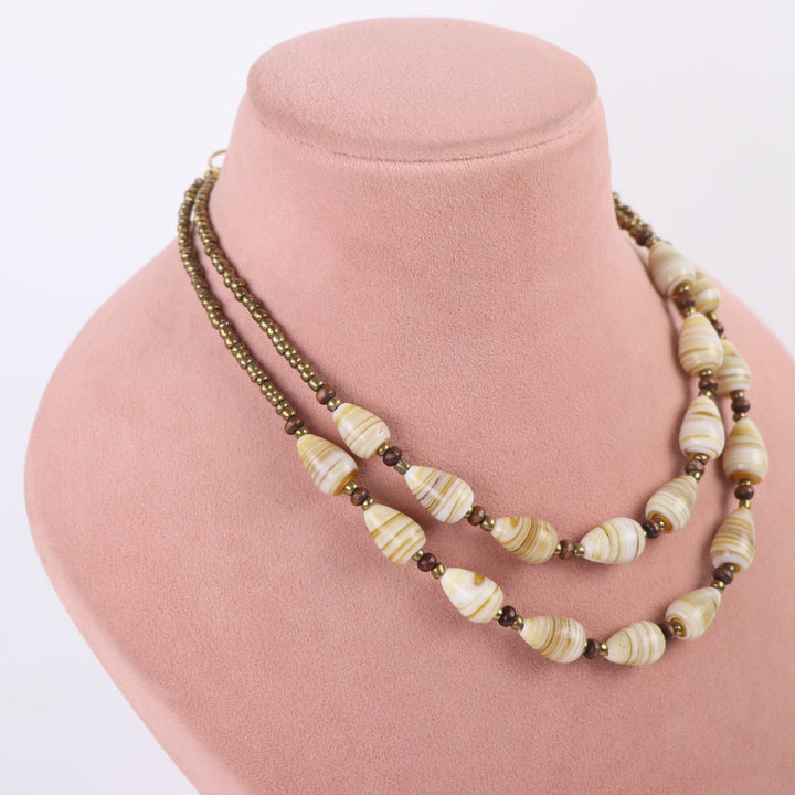 Delemon cream and beige swirl patterned oval bead double-strand necklace