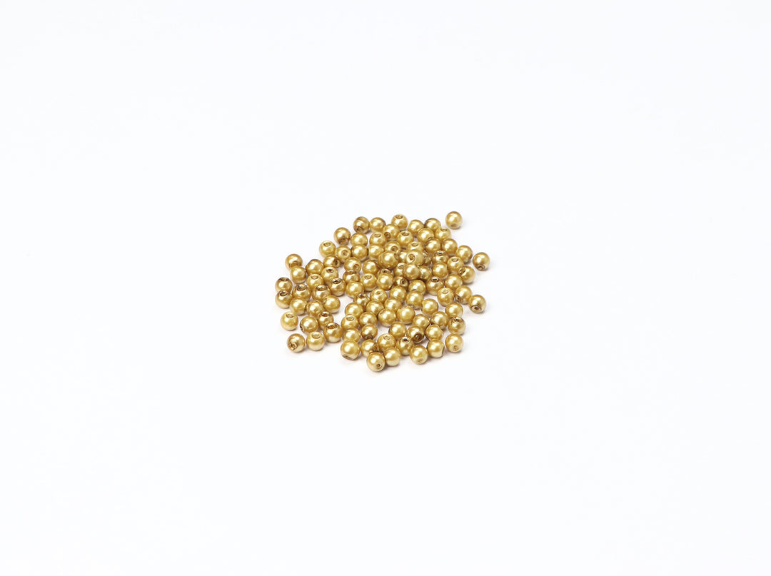 Gold Fancy Glass Bead In Round Shape