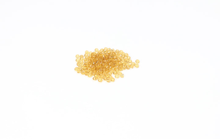 Gold Fancy Faceted Glass Bead In Round Shape