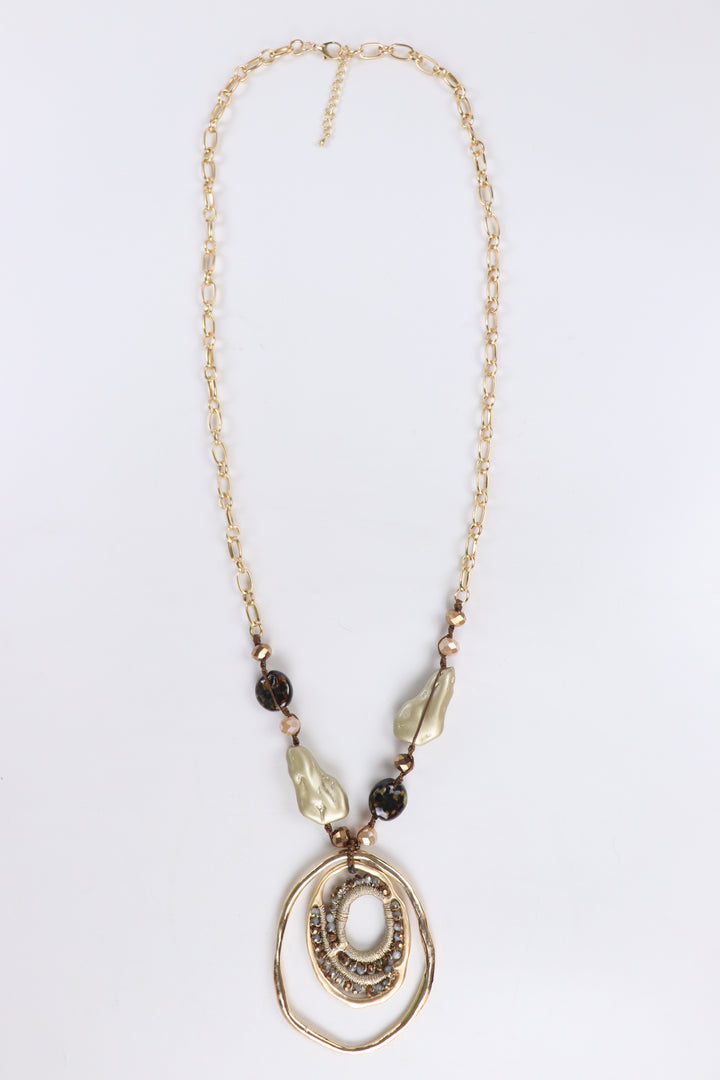 Delemon abstract gold concentric ring statement pendant necklace with crystal and bead accents