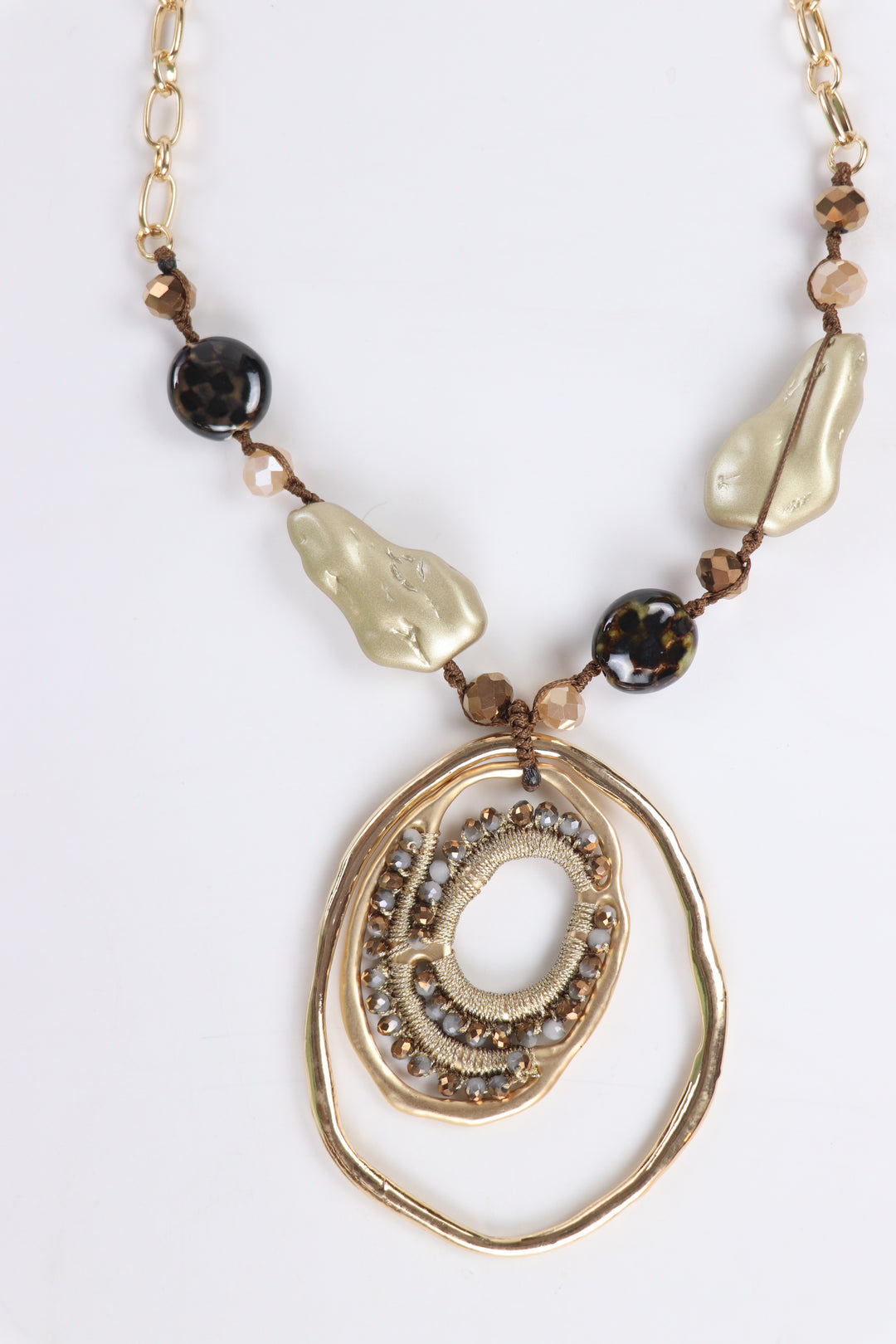 Delemon abstract gold concentric ring statement pendant necklace with crystal and bead accents