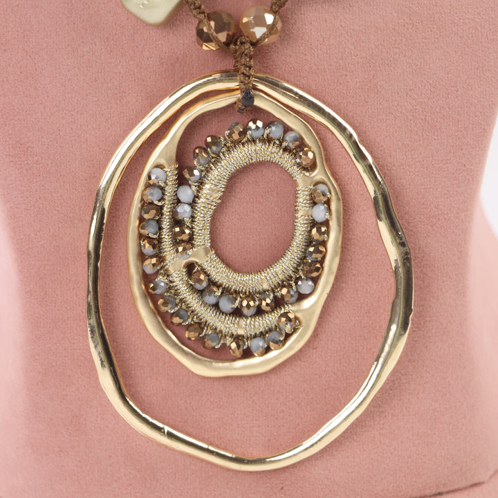 Delemon abstract gold concentric ring statement pendant necklace with crystal and bead accents