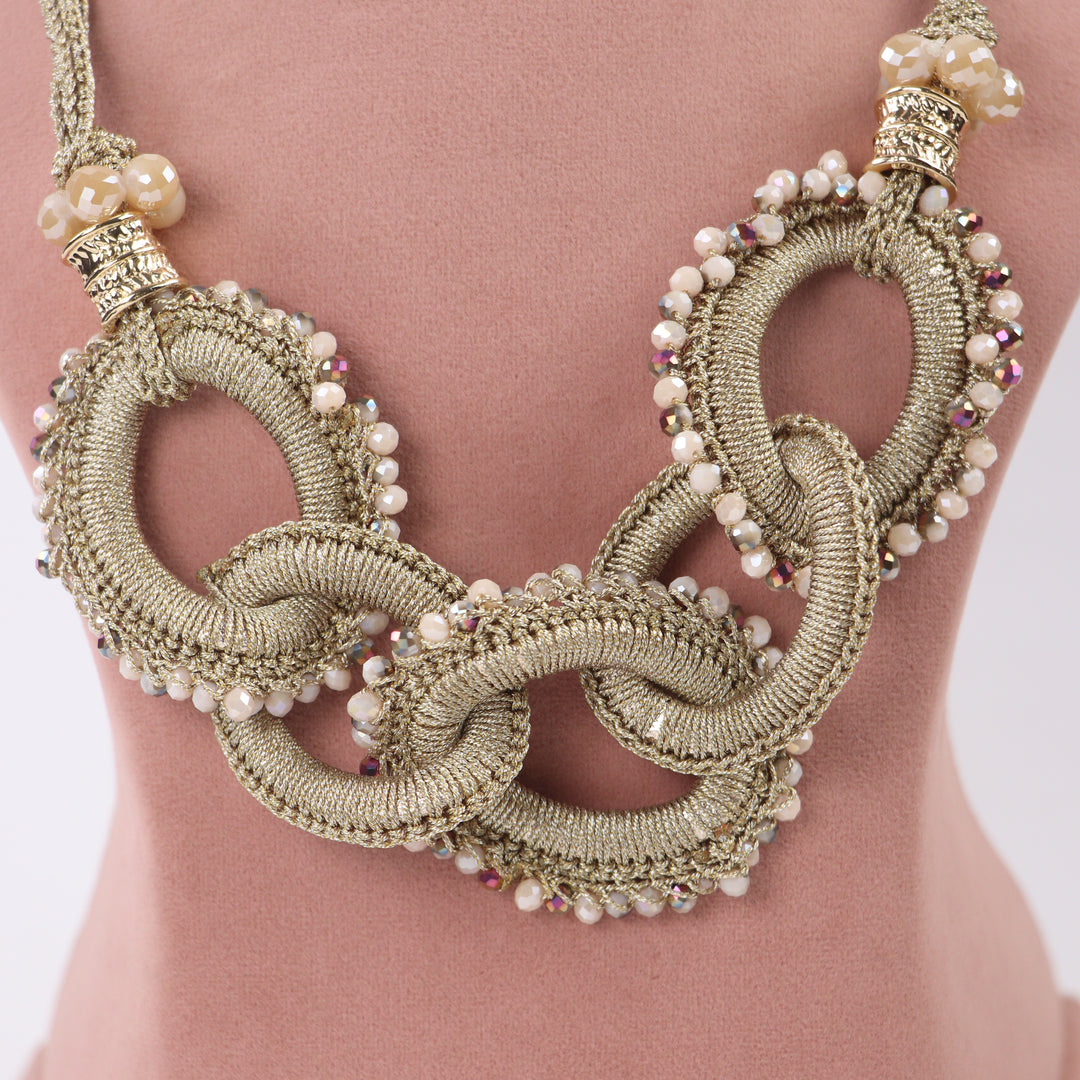 Delemon champagne gold thread-wrapped interlocking ring statement necklace with crystal edging