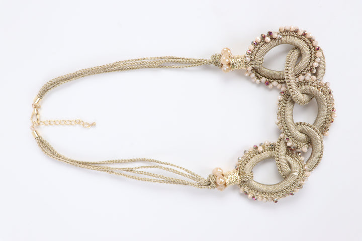 Delemon champagne gold thread-wrapped interlocking ring statement necklace with crystal edging