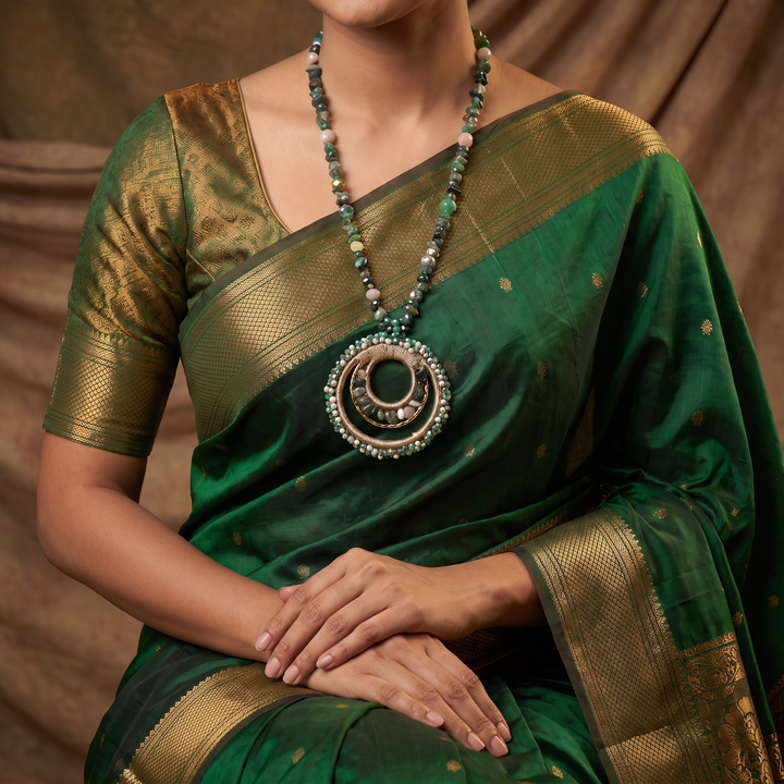 Delemon emerald green natural stone chip long necklace with gold concentric ring pendant