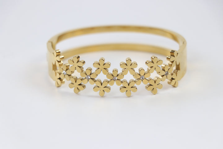 Delemon gold blossom lattice interlocking flower cuff bangle bracelet with clear crystal centers in waterproof 18k gold plated stainless stee