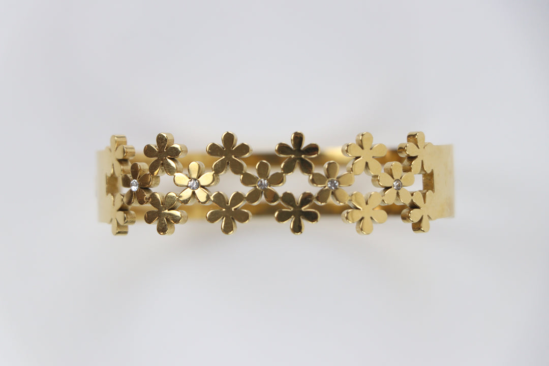 Delemon gold blossom lattice interlocking flower cuff bangle bracelet with clear crystal centers in waterproof 18k gold plated stainless stee
