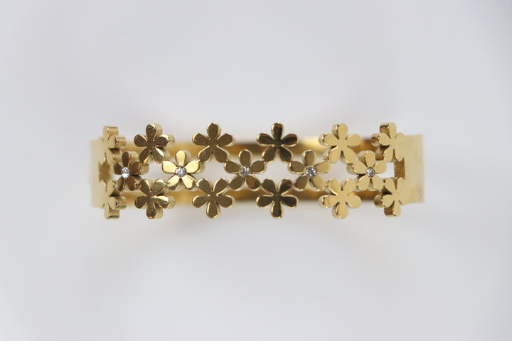 Delemon gold blossom lattice interlocking flower cuff bangle bracelet with clear crystal centers in waterproof 18k gold plated stainless stee