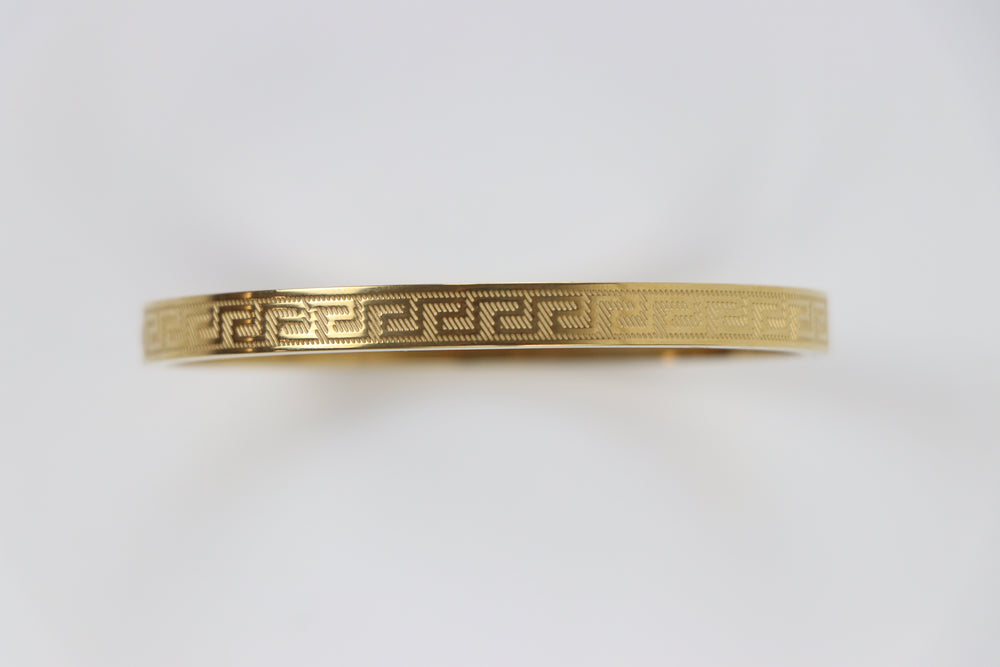 Delemon gold Greek key engraved geometric bangle bracelet in waterproof 18k gold plated stainless steel