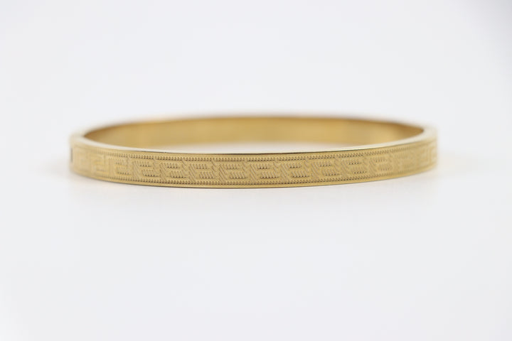 Delemon gold Greek key engraved geometric bangle bracelet in waterproof 18k gold plated stainless steel