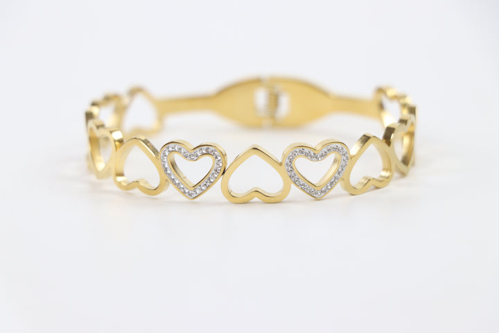Delemon gold open-heart interlocking link bangle bracelet with alternating pavé crystal hearts in waterproof 18k gold plated stainless steel