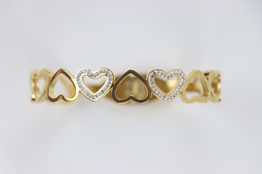 Delemon gold open-heart interlocking link bangle bracelet with alternating pavé crystal hearts in waterproof 18k gold plated stainless steel