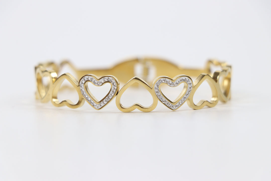 Delemon gold open-heart interlocking link bangle bracelet with alternating pavé crystal hearts in waterproof 18k gold plated stainless steel
