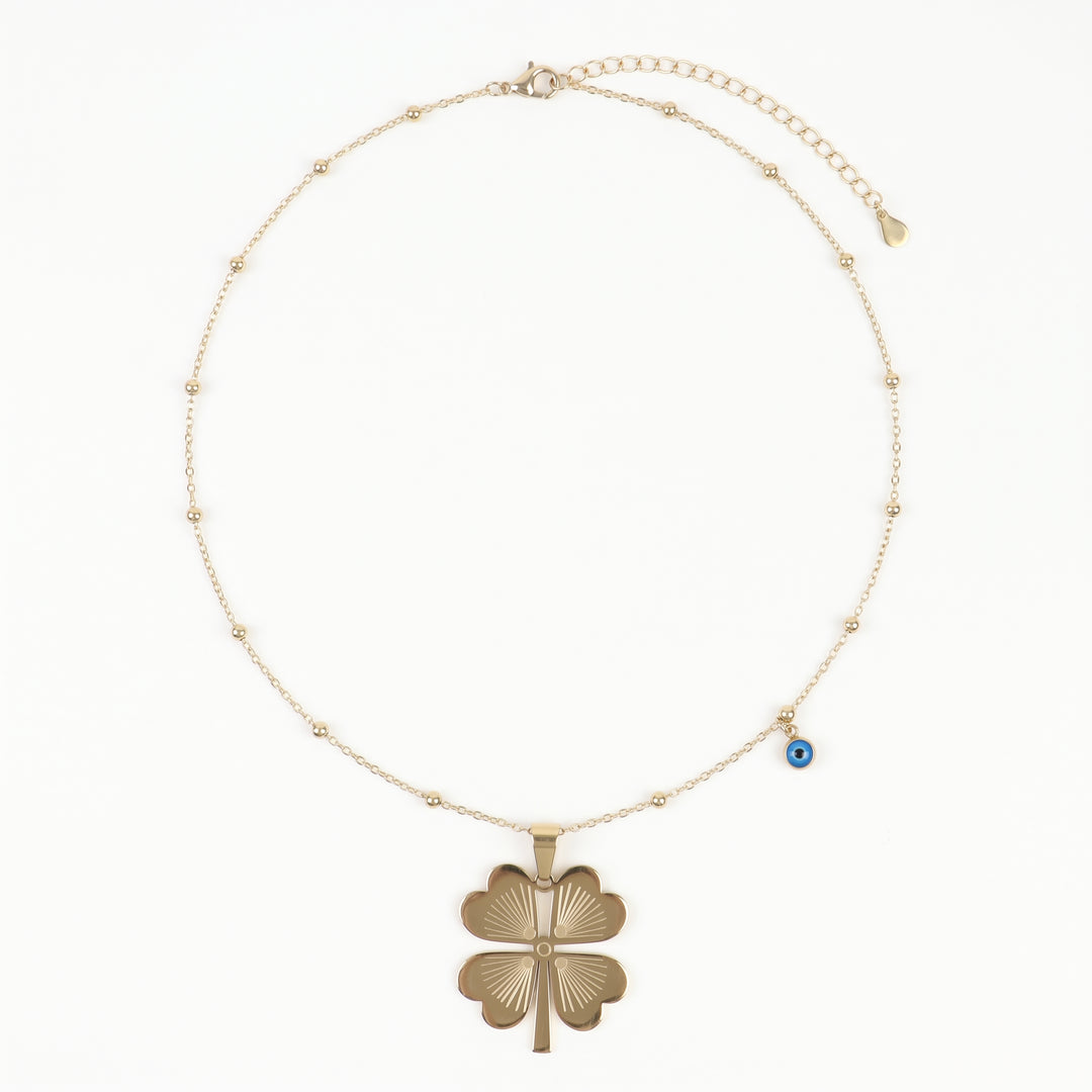 Delemon high-quality gold plated delicate bead chain necklace featuring a large central four-leaf clover pendant with an engraved pattern and a small hanging blue evil eye charm