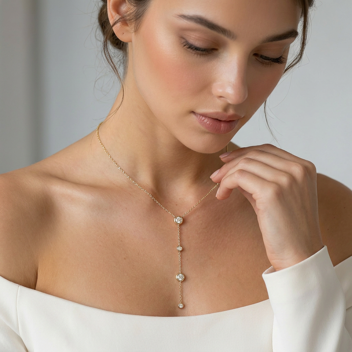 Delemon high-quality gold plated delicate Y-shaped drop necklace featuring round bezel-set clear crystal