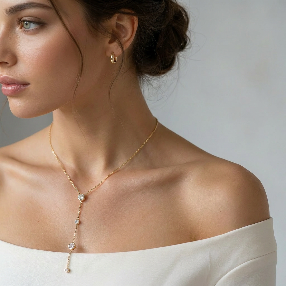 Delemon high-quality gold plated delicate Y-shaped drop necklace featuring round bezel-set clear crystal