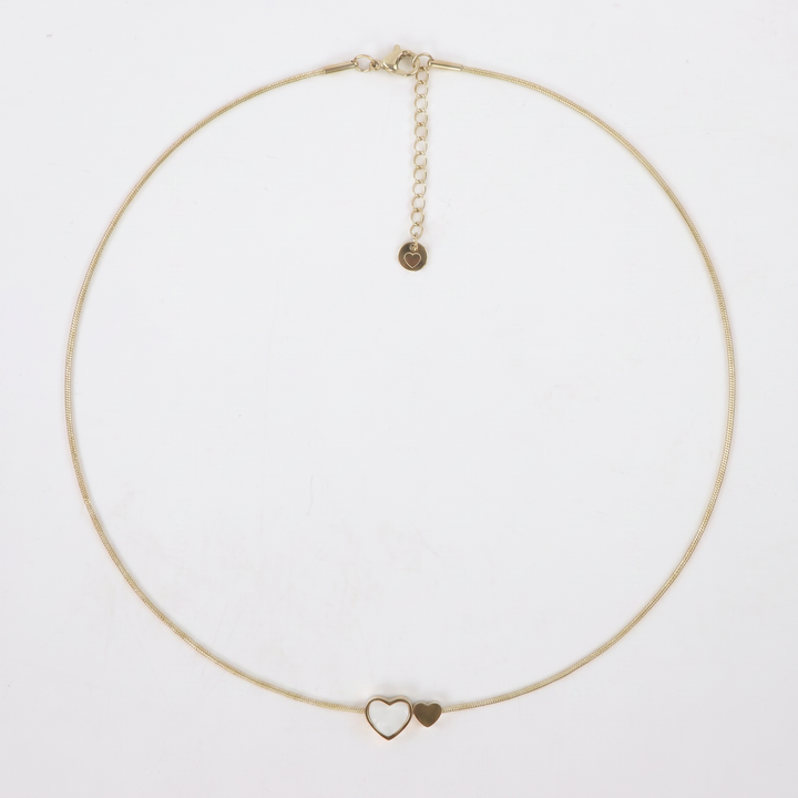 Delemon high-quality gold plated thin snake chain necklace featuring a central double heart pendant with one white mother-of-pearl heart and one smaller solid gold heart