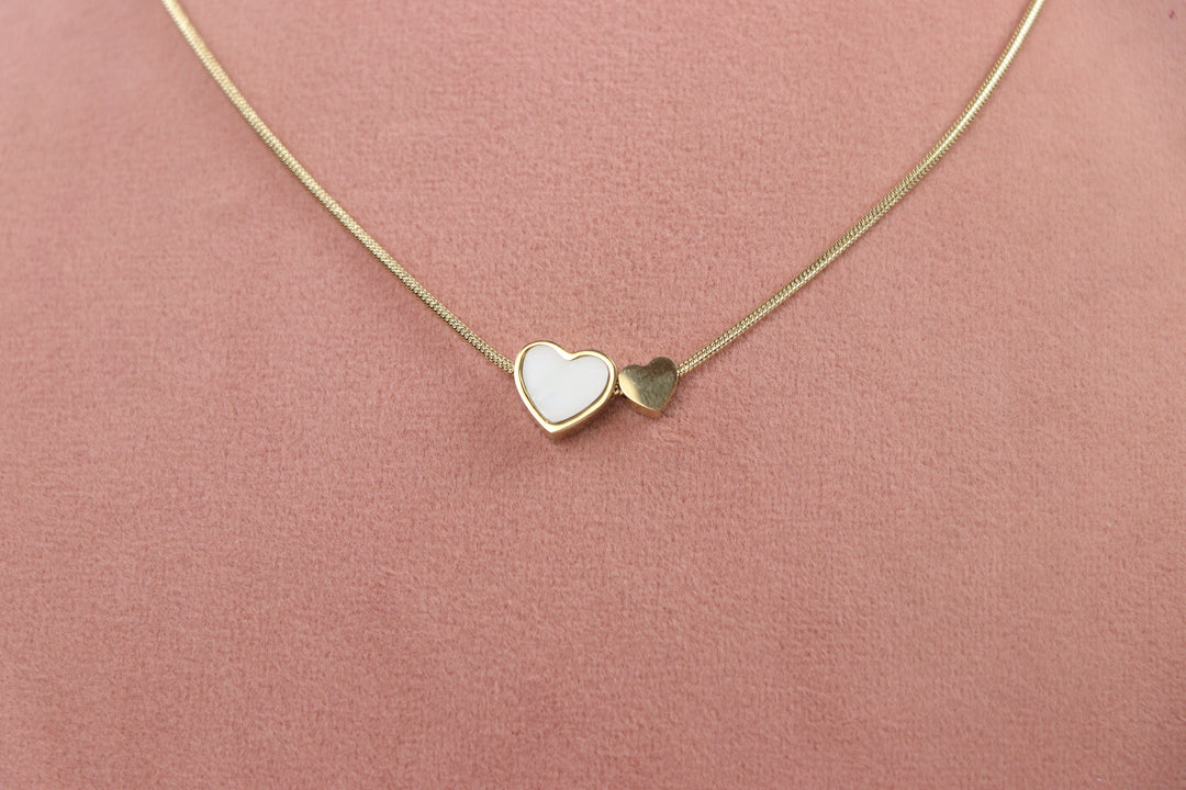 Delemon high-quality gold plated snake chain necklace featuring a white enamel heart pendant alongside a mini solid gold heart charm.