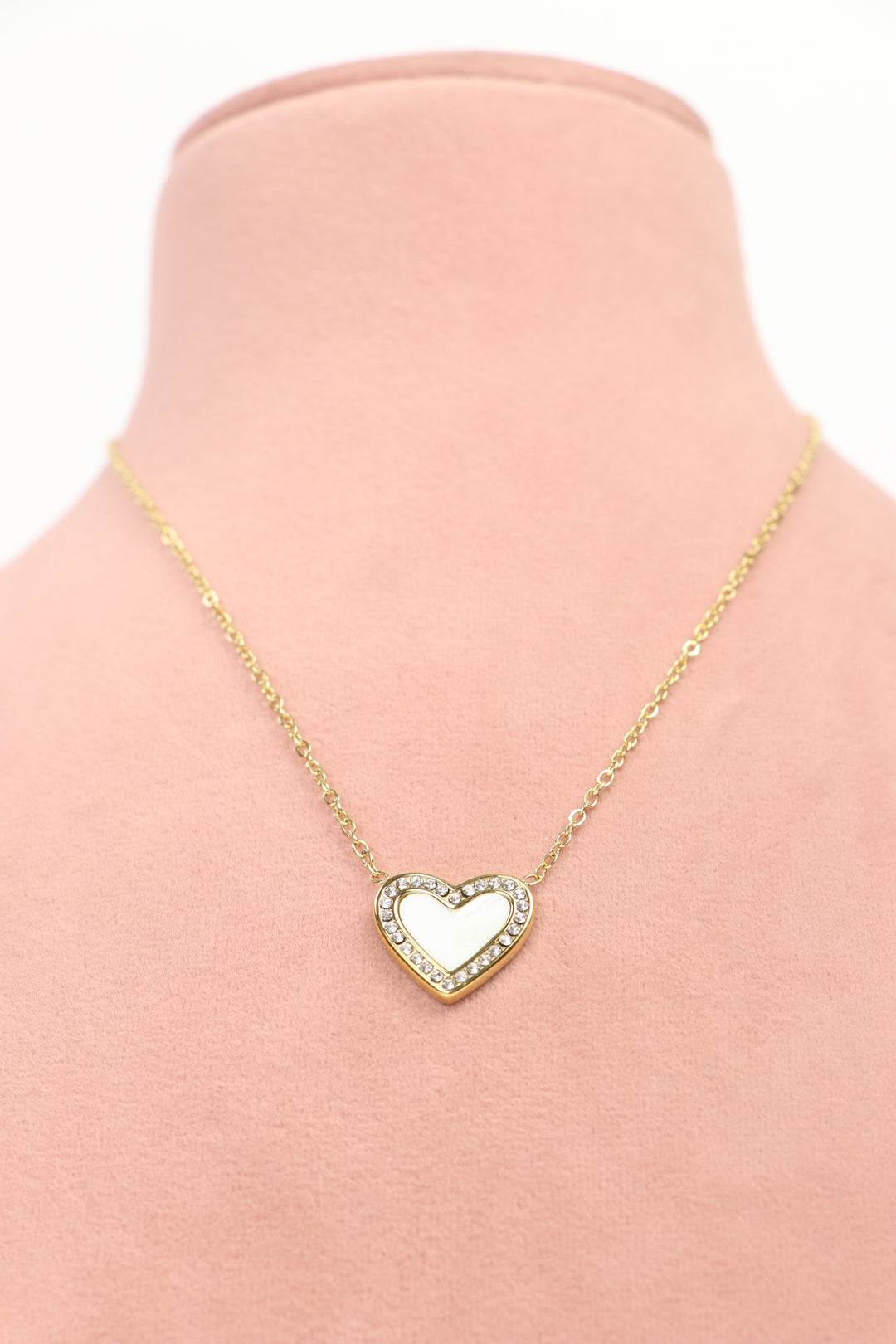 Delemon high-quality gold plated chain necklace featuring a single heart pendant with crystal border front view.