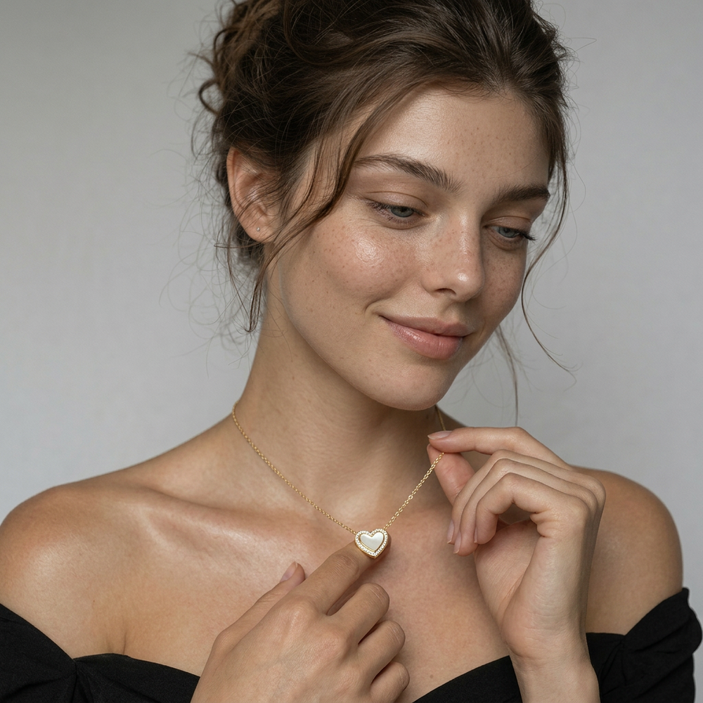 Delemon high-quality gold plated chain necklace featuring a central heart pendant with a white mother-of-pearl center and crystal border
