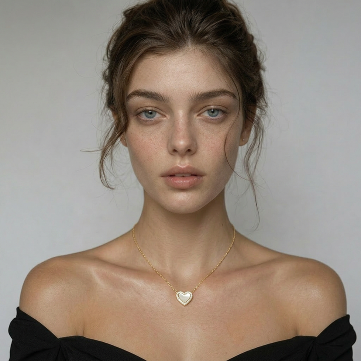 Delemon high-quality gold plated chain necklace featuring a central heart pendant with a white mother-of-pearl center and crystal border