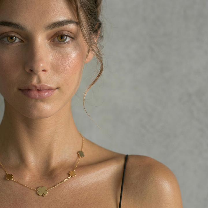 Delemon high-quality gold plated delicate chain necklace featuring multiple small four-leaf clover charms