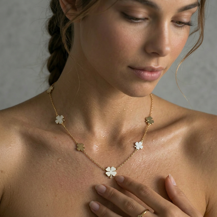 Delemon high-quality gold plated delicate chain necklace featuring multiple small four-leaf clover charms