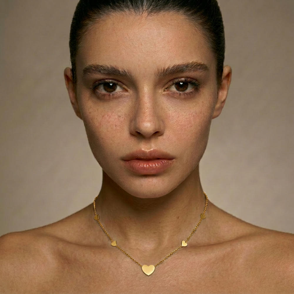 Delemon high-quality gold plated chain necklace featuring multiple delicate heart charms in a station design