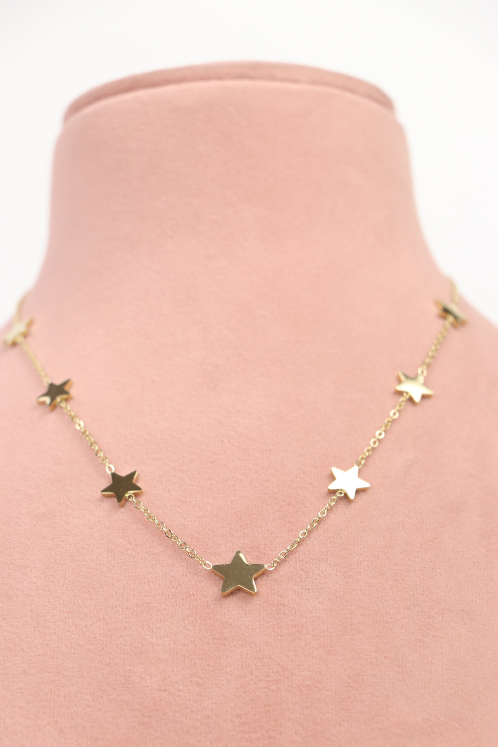 Delemon high-quality gold plated chain necklace featuring multiple delicate star charms in a station design front view.