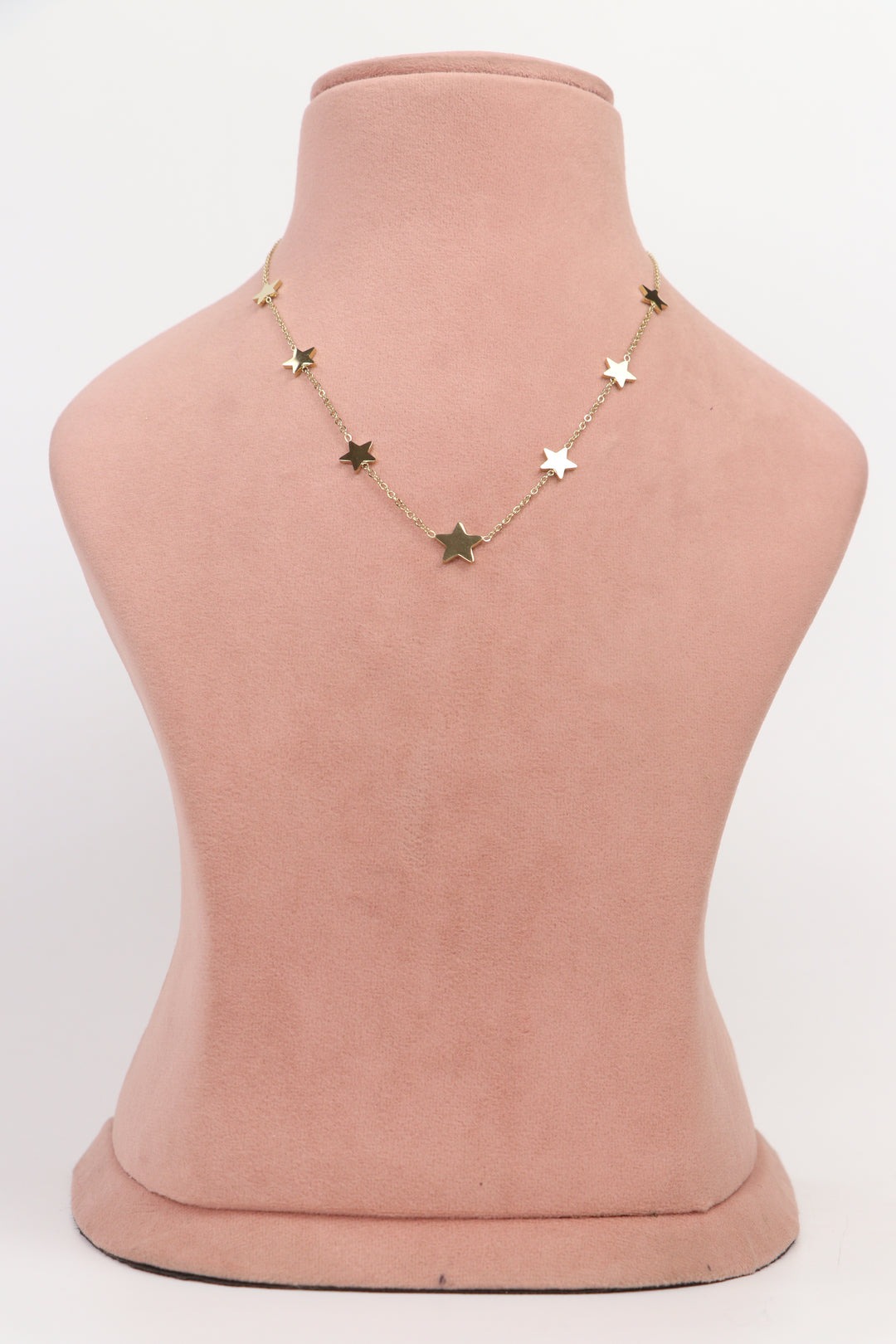 Delemon high-quality gold plated chain necklace featuring multiple delicate star charms in a station design full front view.