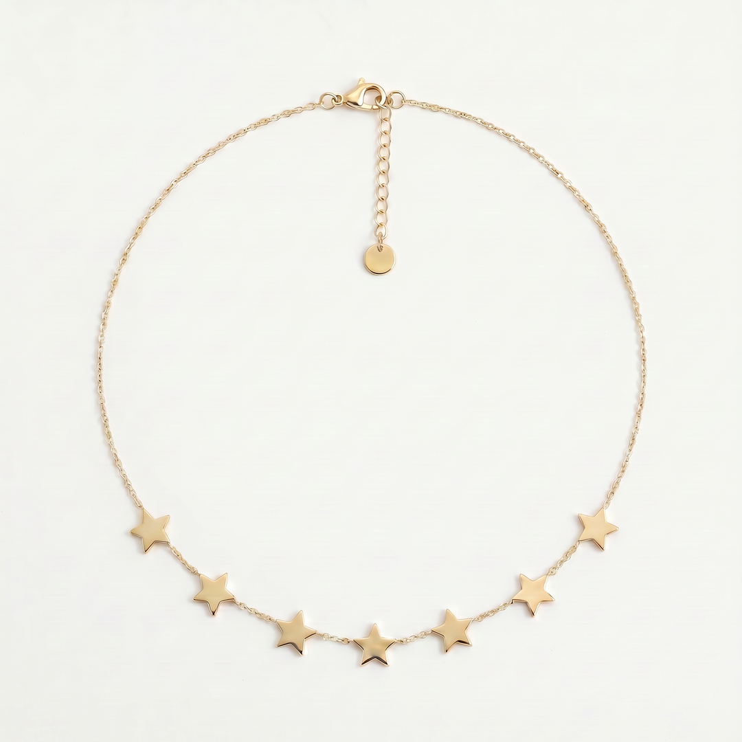 Delemon high-quality gold plated chain necklace featuring multiple delicate star charms in a station design