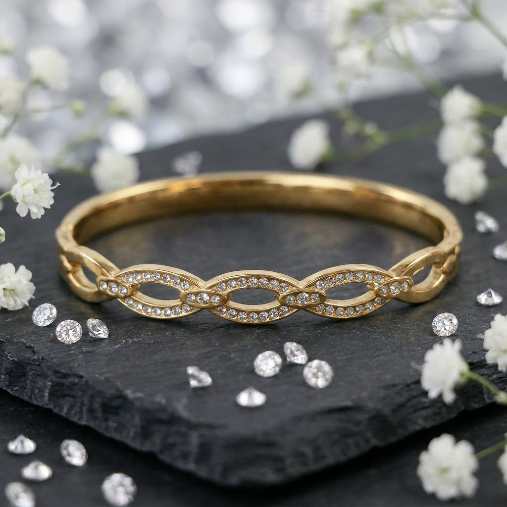 Delemon gold Seraphina infinity loop rigid bangle bracelet with micro-pavé crystal borders in waterproof 18k gold plated stainless steel