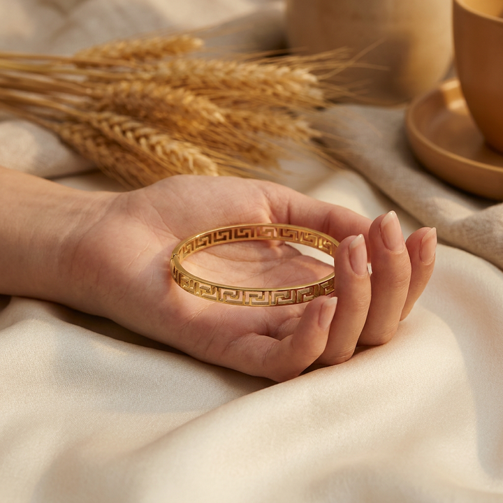 Delemon gold slim Greek key cut-out geometric bangle bracelet in waterproof 18k gold plated stainless steel