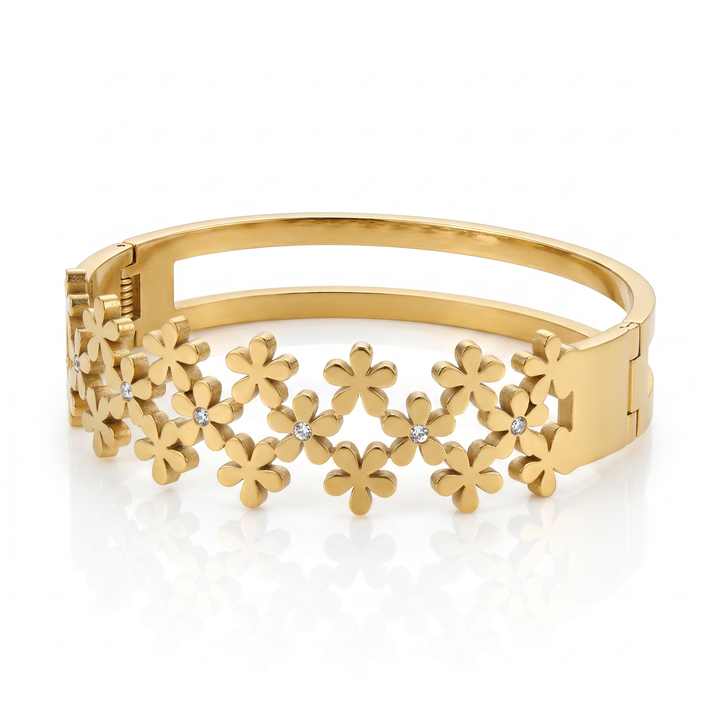 Delemon high-quality gold plated stainless steel bangle bracelet featuring an intricate clustered design of small five-petal flowers accented with delicate crystals