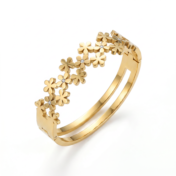 Delemon high-quality gold plated stainless steel bangle bracelet featuring an intricate clustered design of small five-petal flowers accented with delicate crystals