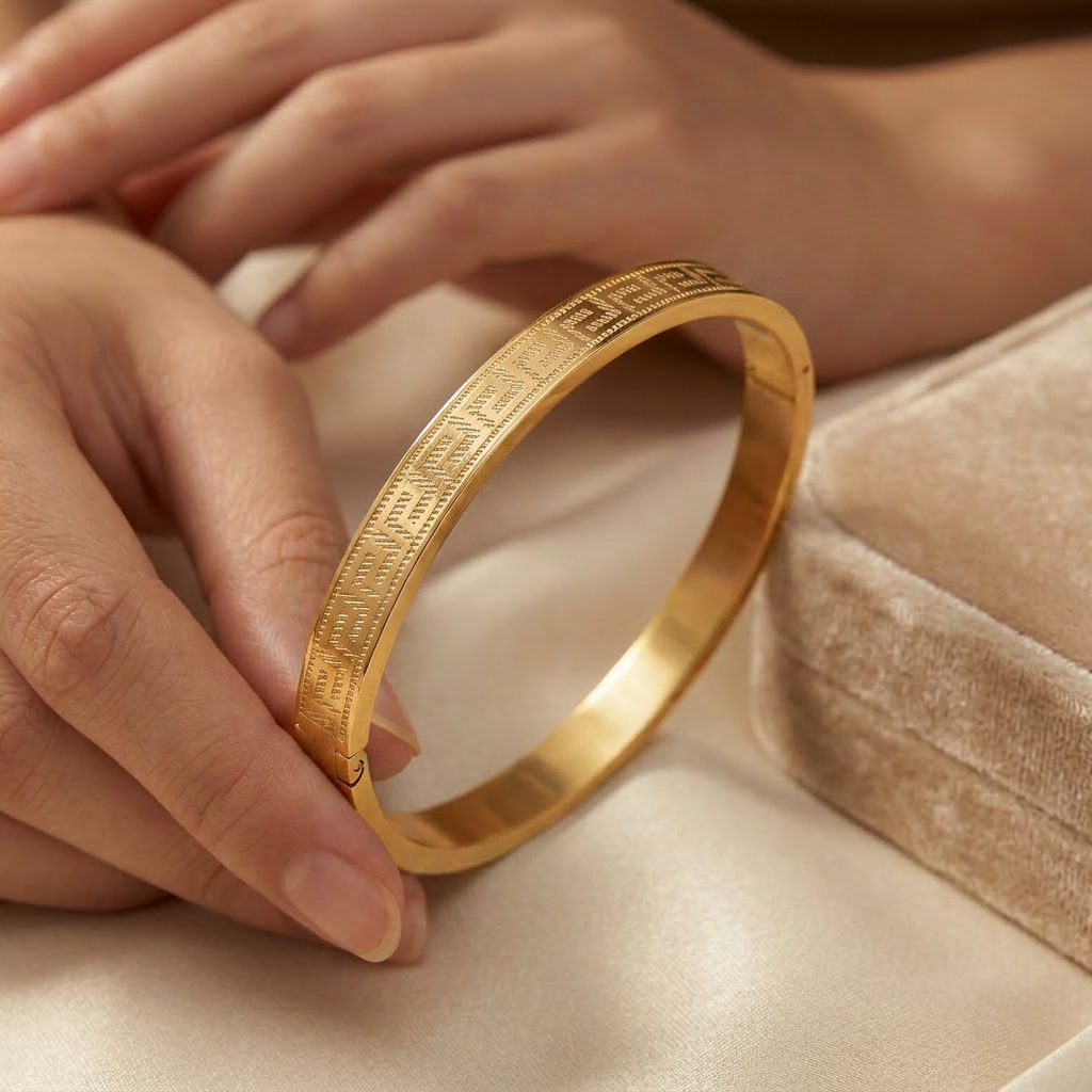 Delemon gold Greek key engraved geometric bangle bracelet in waterproof 18k gold plated stainless steel